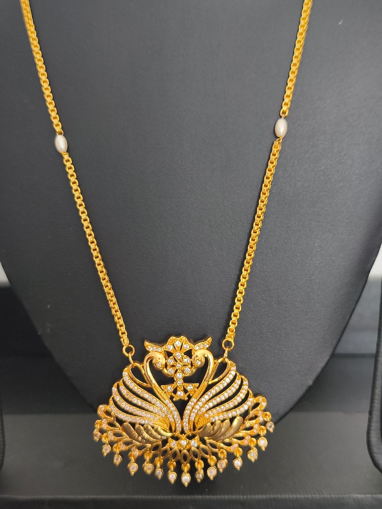 Micro gold Swan Pathakkam