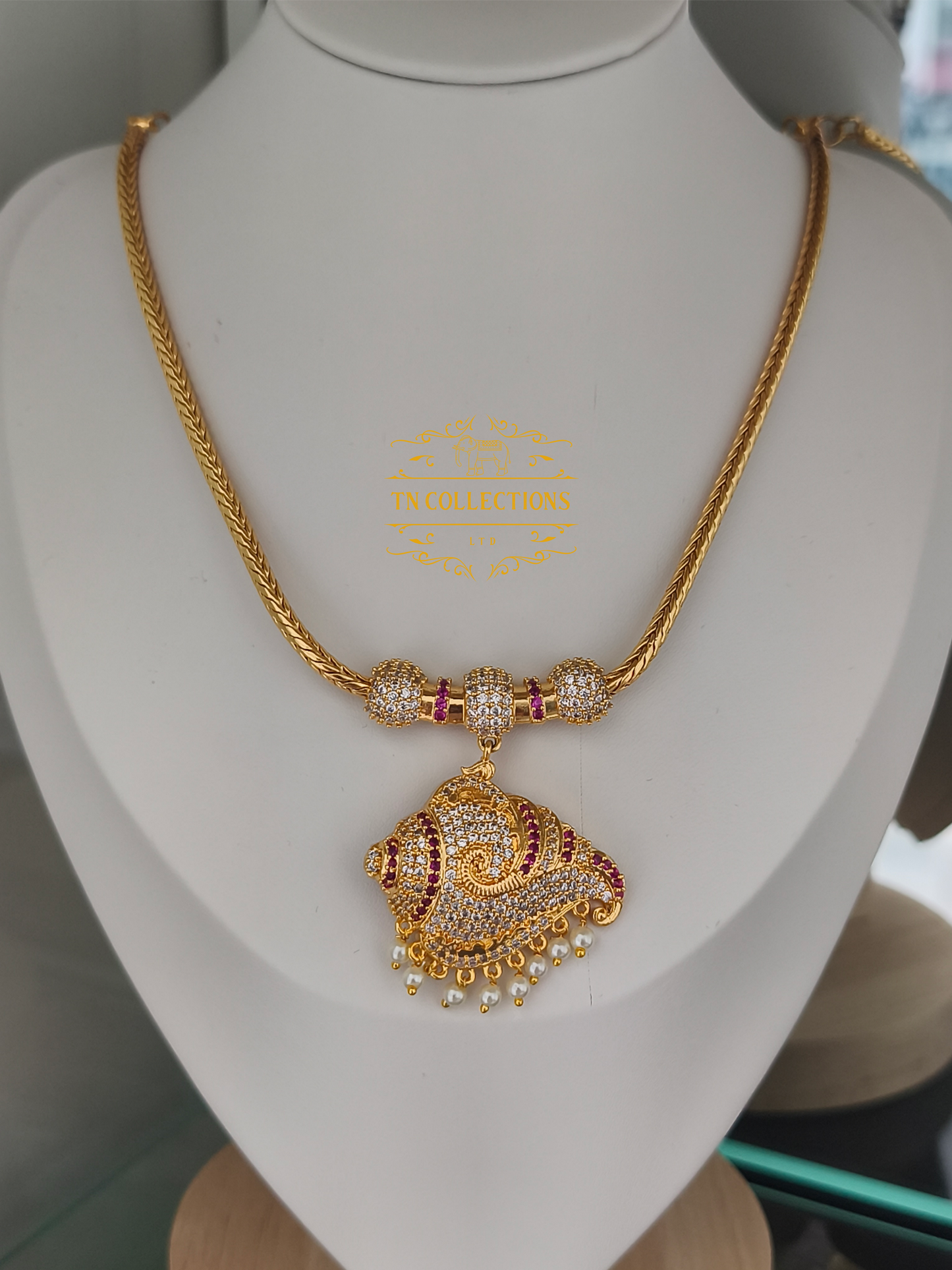 Micro Gold-Plated Traditional Sangu Attiyal (Ruby & white stones)