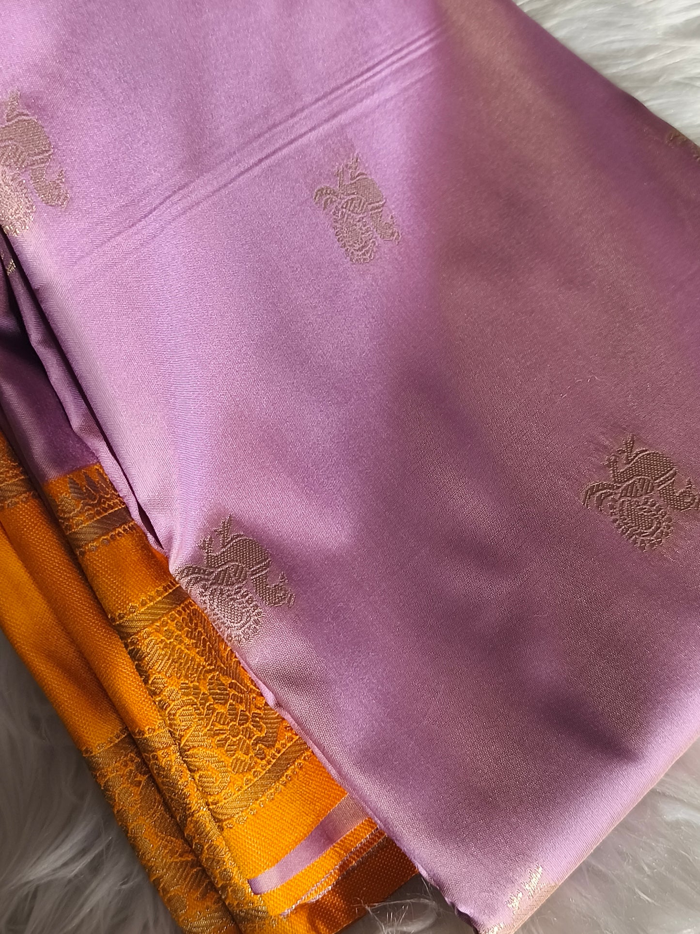 Stunning Kanchi Semi silk saree with contrast blouse