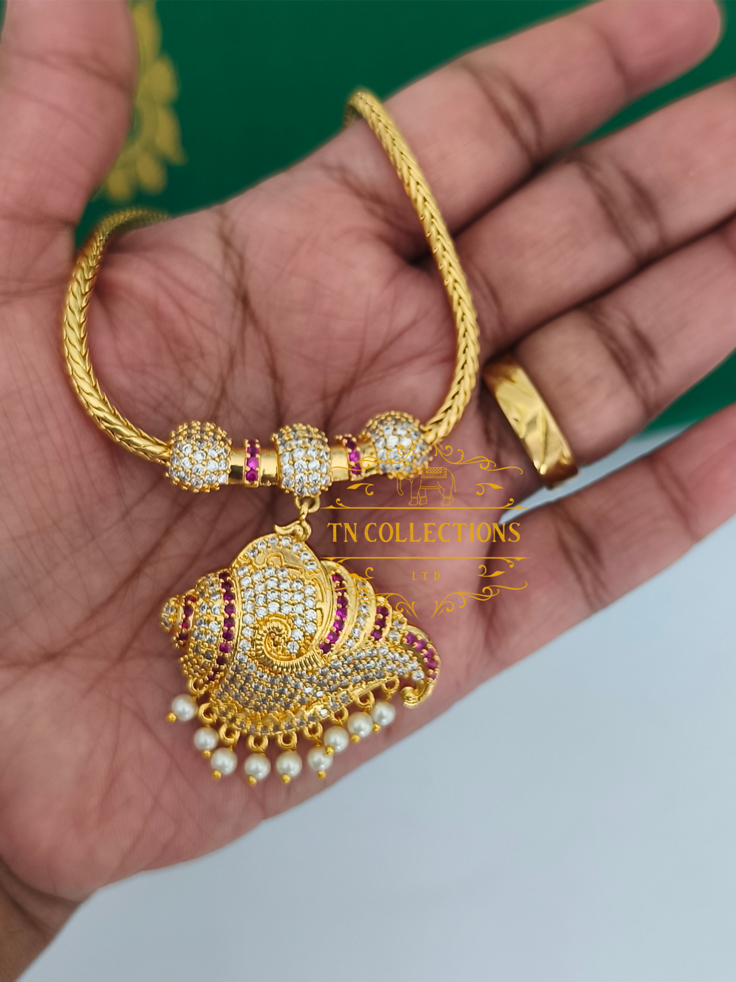 Micro Gold-Plated Traditional Sangu Attiyal (Ruby & white stones)