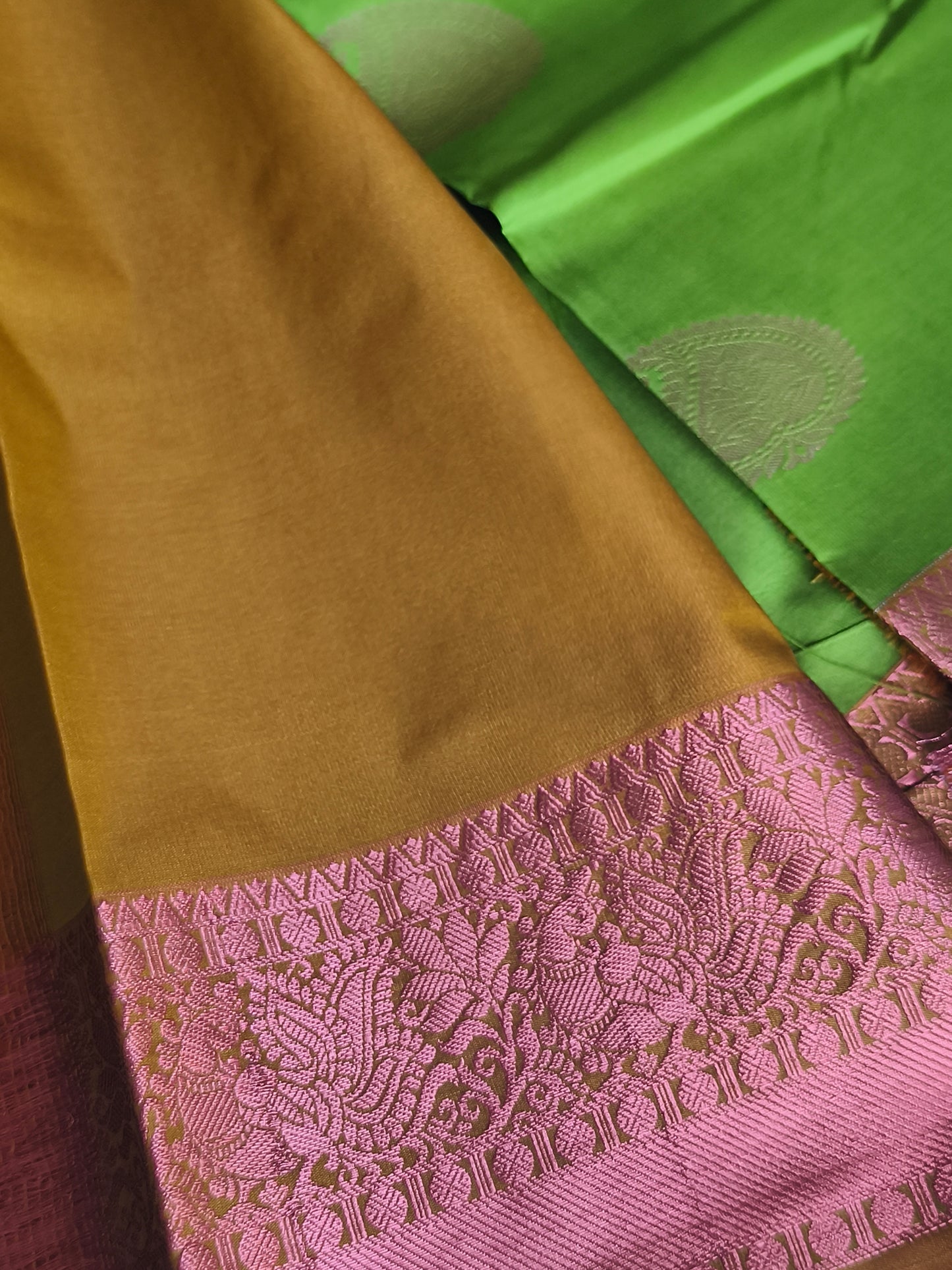 Kanchi Semi silk saree with contrast blouse and pallu.