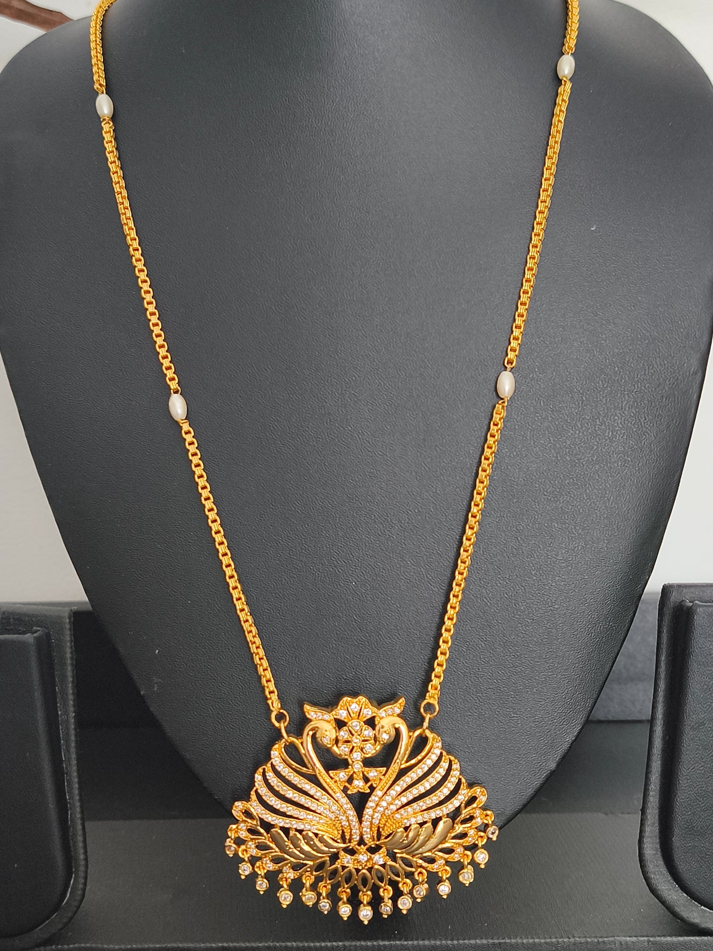 Micro gold Swan Pathakkam