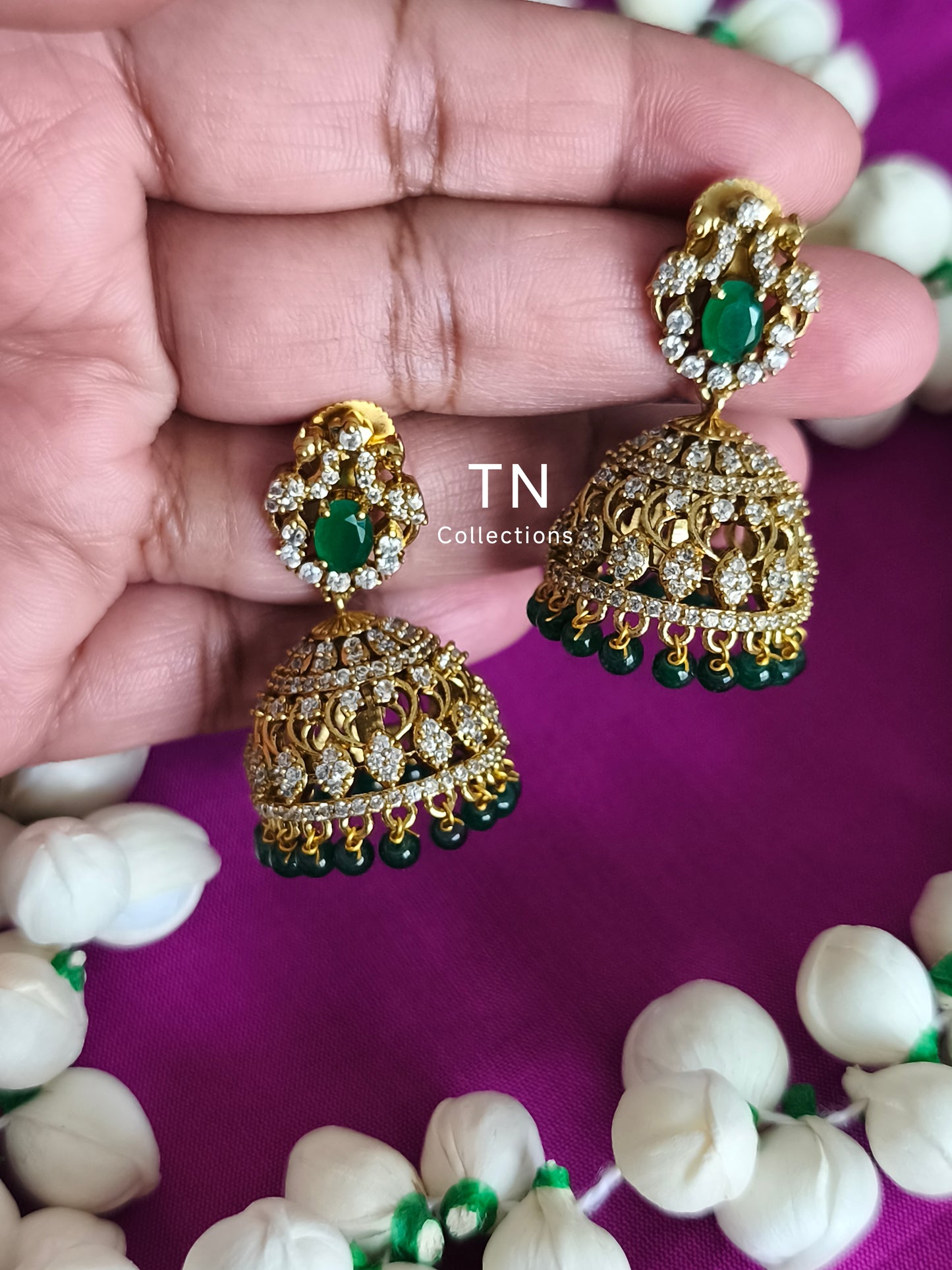 AD Antique Matte Finish Green Jhumka Earrings