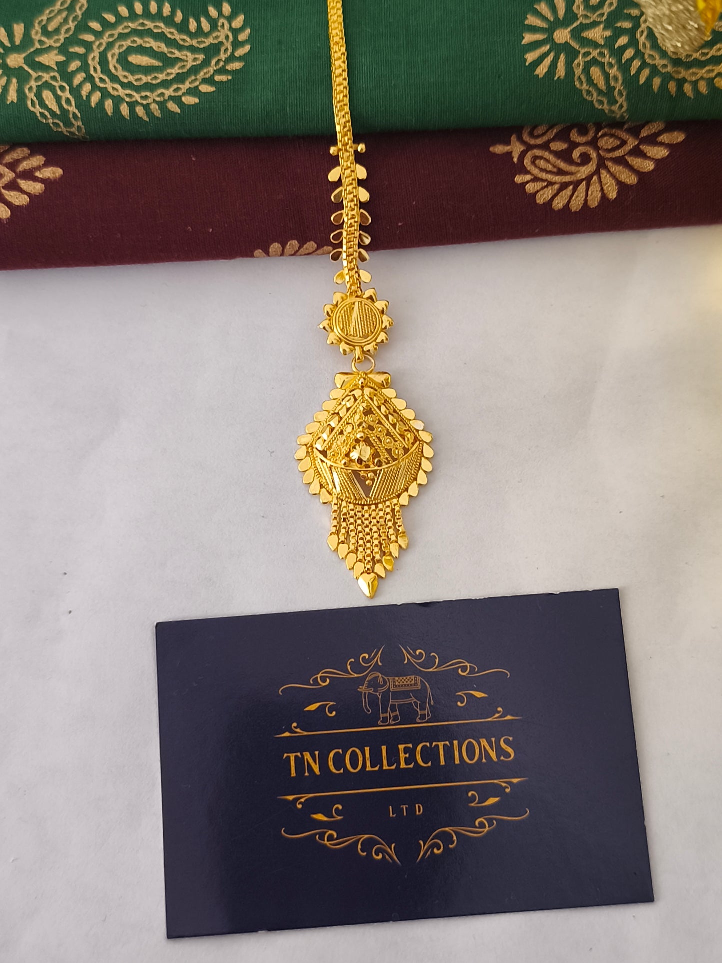 One gram gold forming Tikka