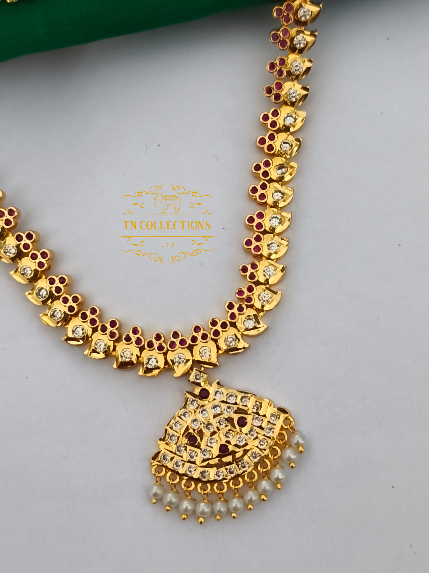 Micro Gold Plated Traditional Attiyal with earrings (Ruby & White stones)