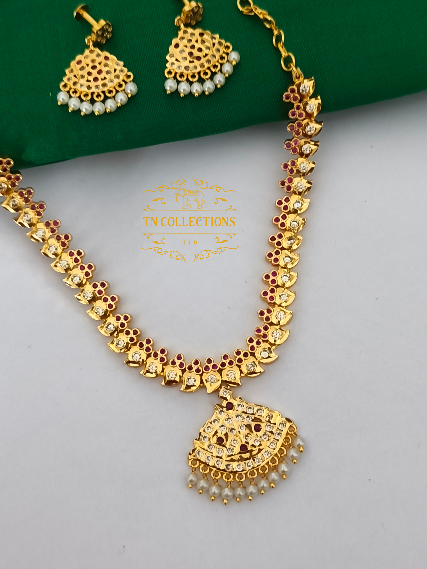 Micro Gold Plated Traditional Attiyal with earrings (Ruby & White stones)