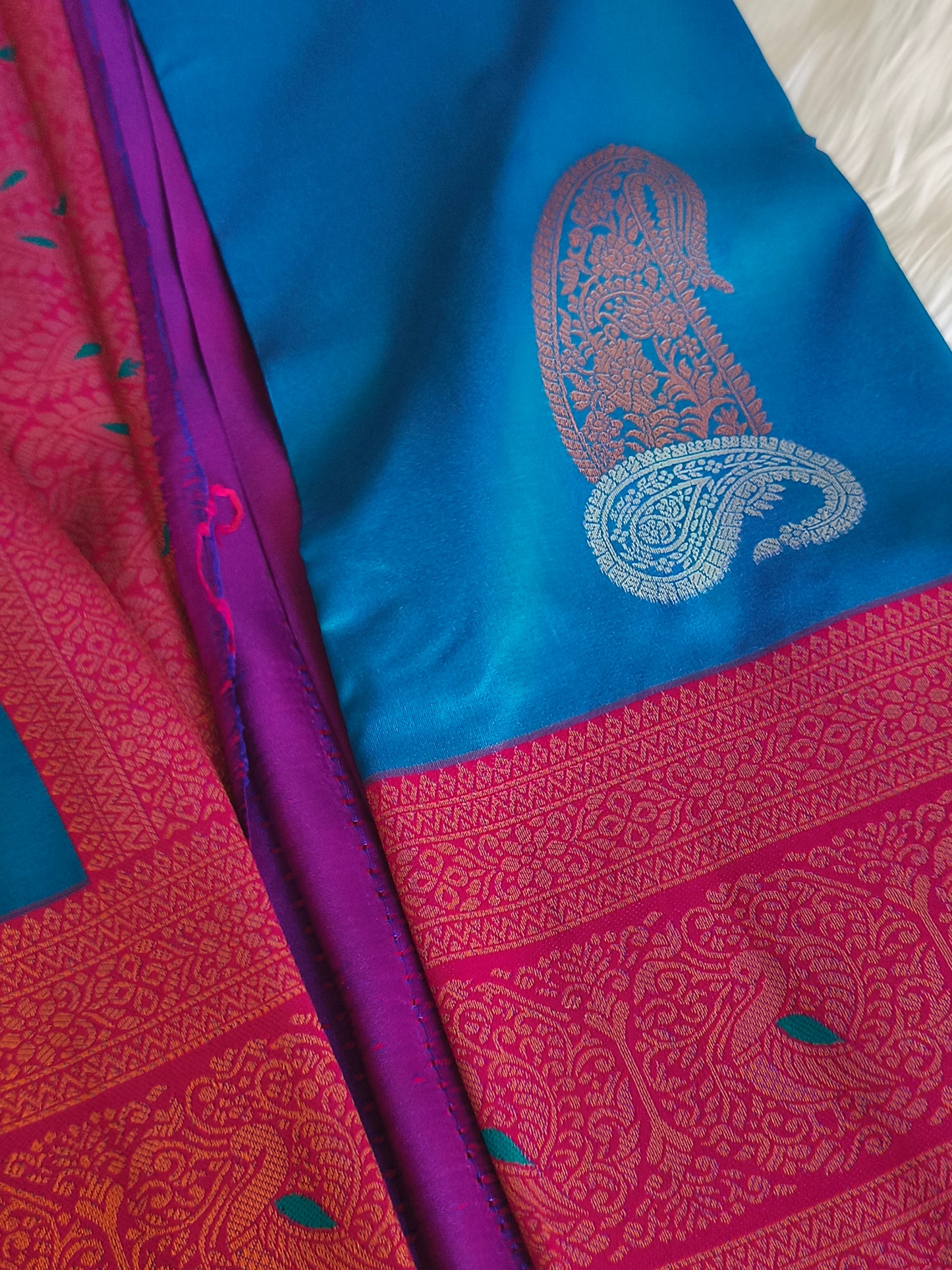 Peacock blue Kanchi Soft Silk Saree with contrast blouse and rich pallu