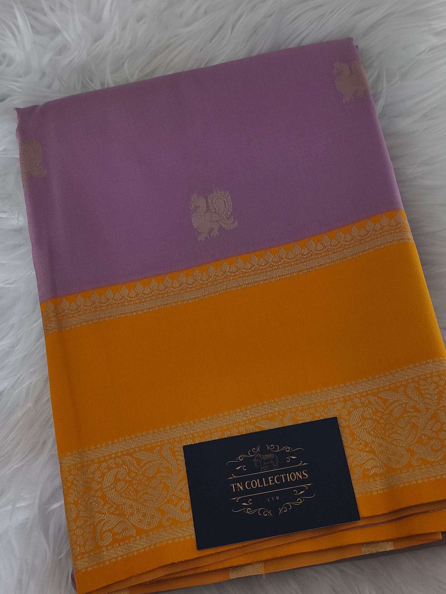 Stunning Kanchi Semi silk saree with contrast blouse