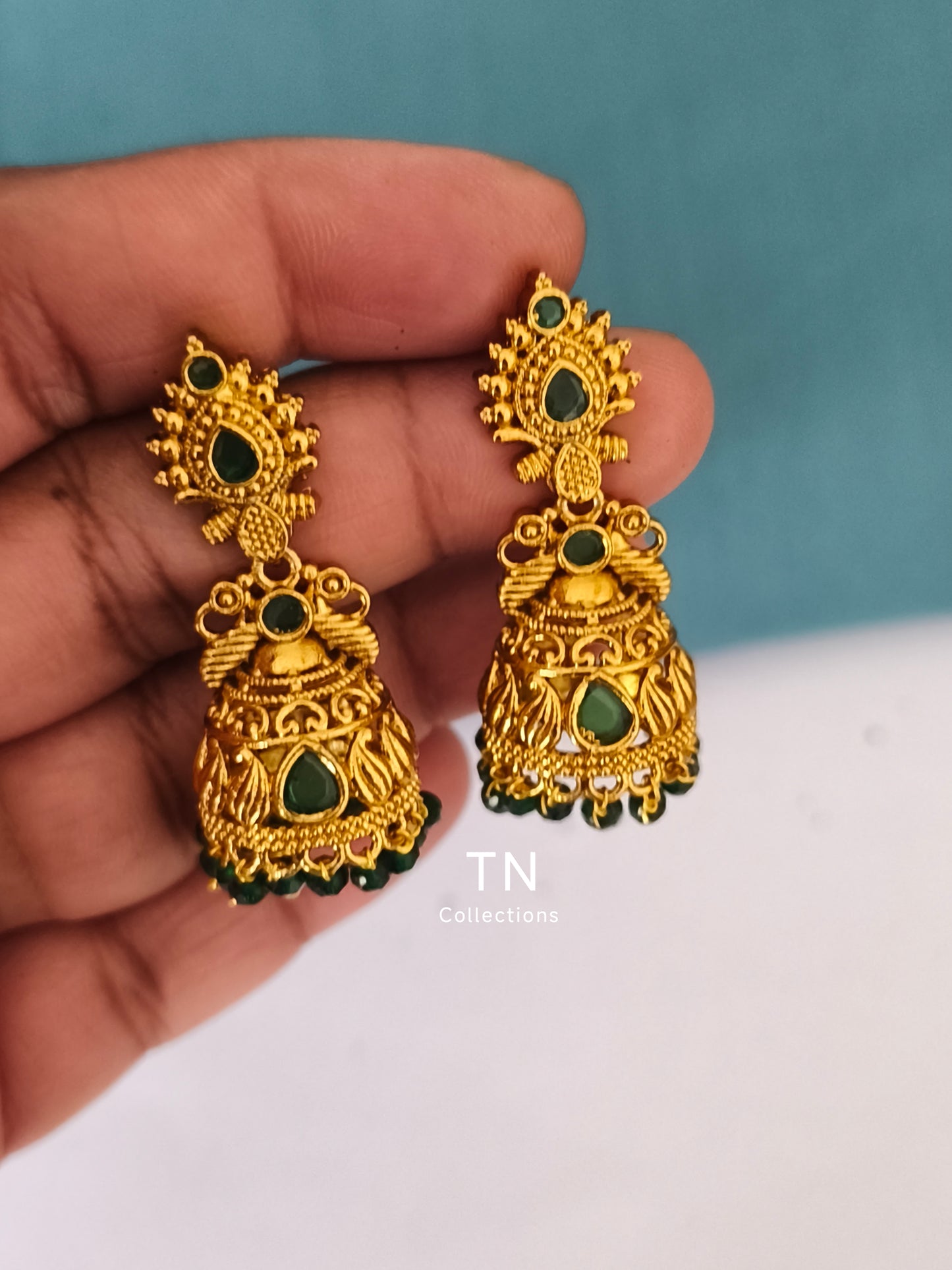 Matte Finish Earrings with green stone and pearls