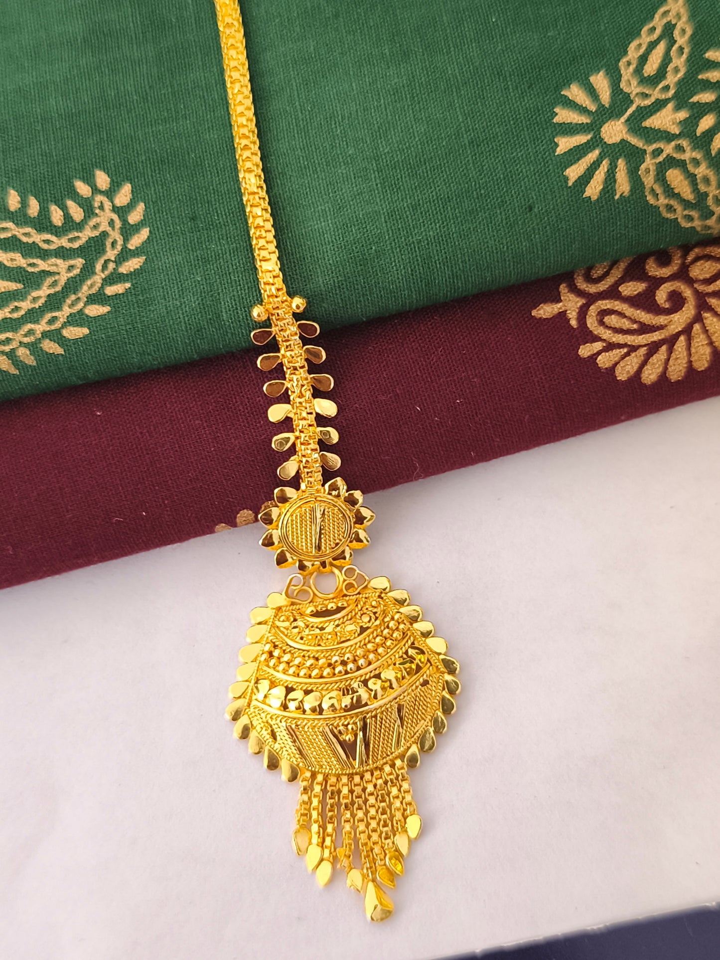 One gram gold forming Tikka