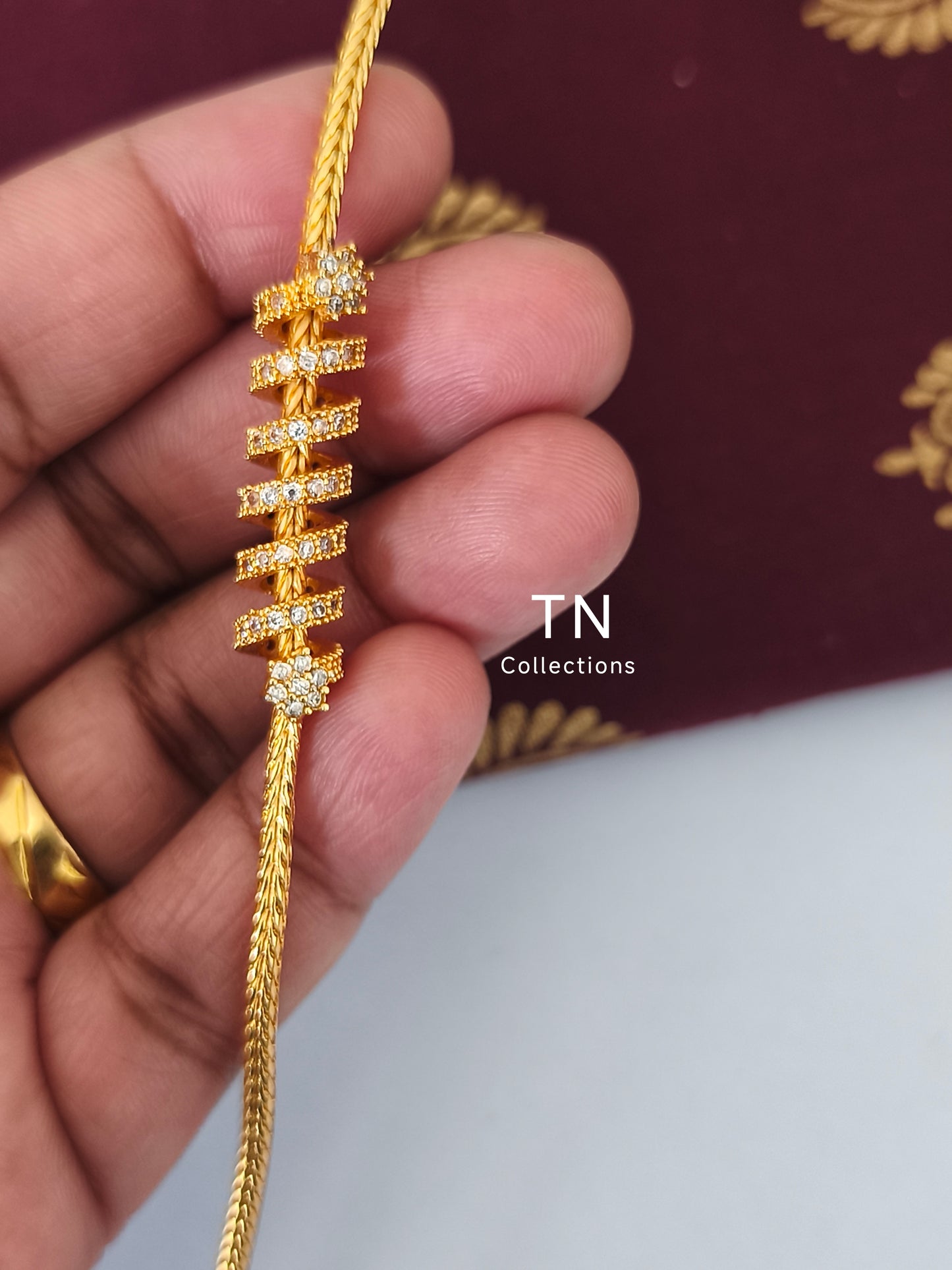 Micro gold plated Traditional Mugappu Kodi (White stone)