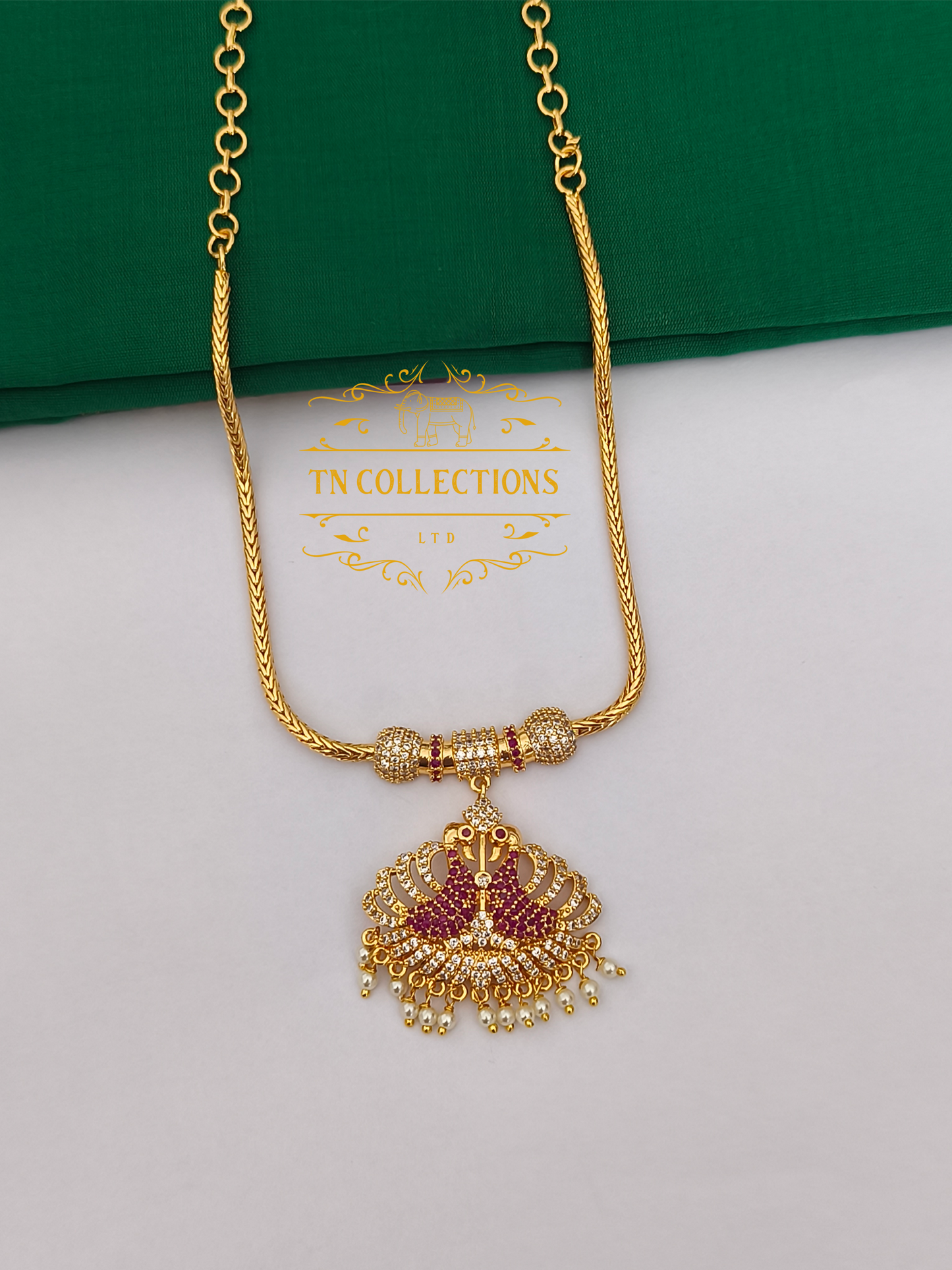 Micro Gold-Plated Peacock Attiyal (Ruby and white stones)