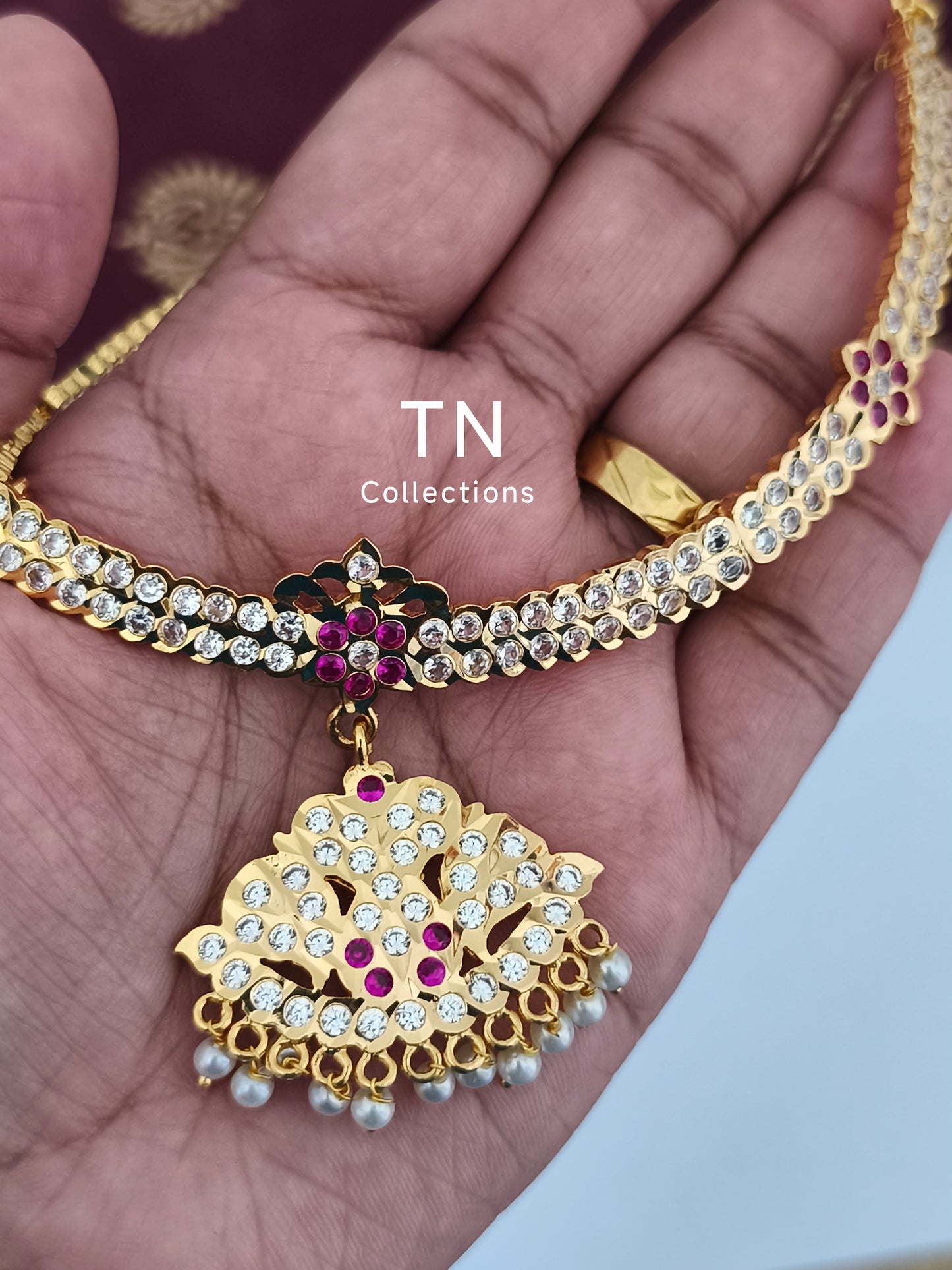 Traditional Gold finish Attiyal with earrings