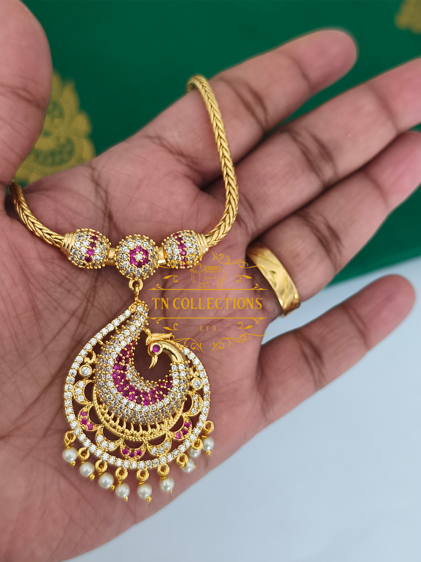 Micro Gold-Plated Traditional Peacock Attiyal (Ruby & white stones)
