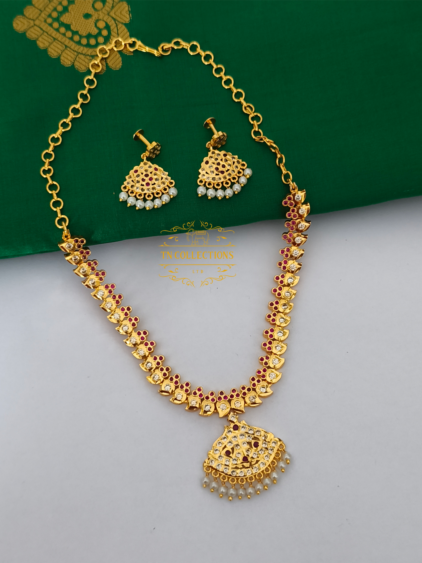 Micro Gold Plated Traditional Attiyal with earrings (Ruby & White stones)