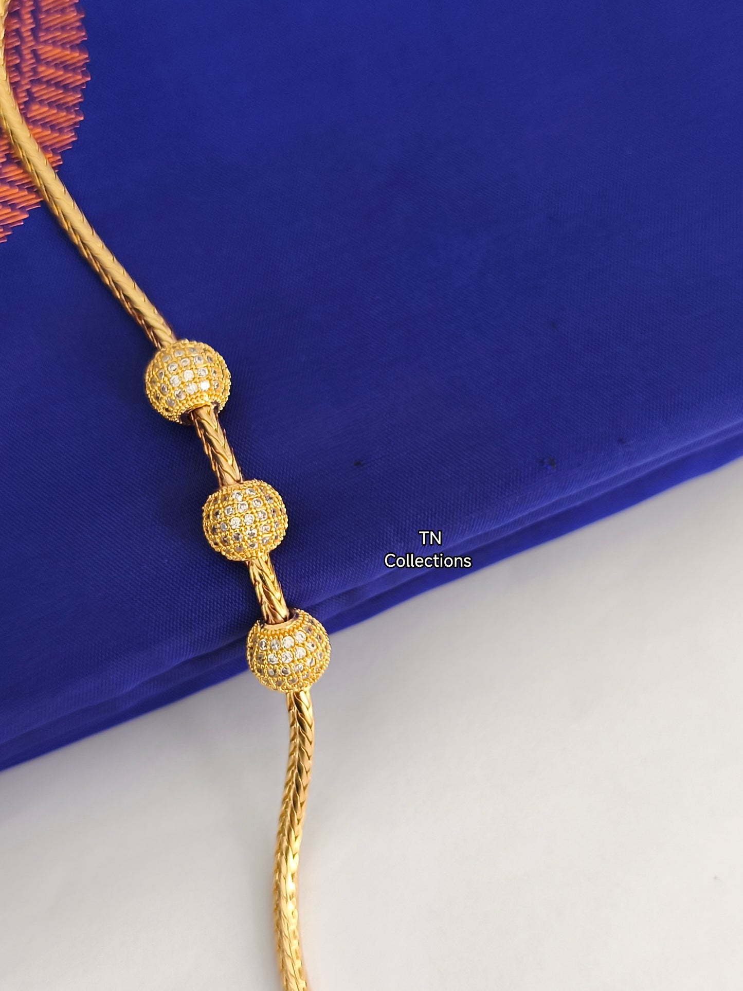Micro gold plated Mugappu Kodi (Full white stones)