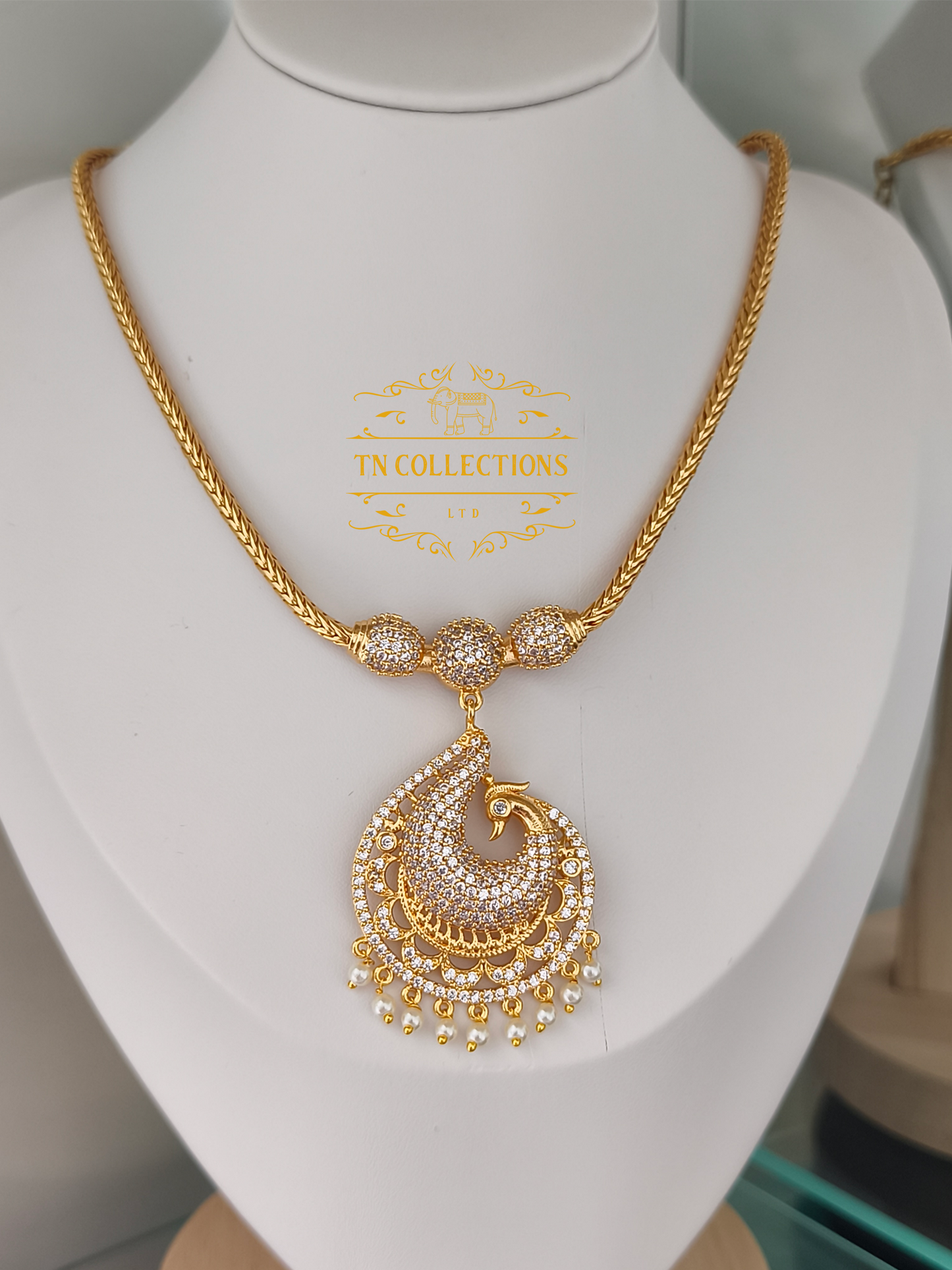 Micro Gold-Plated Traditional Peacock Attiyal (Full white stones)