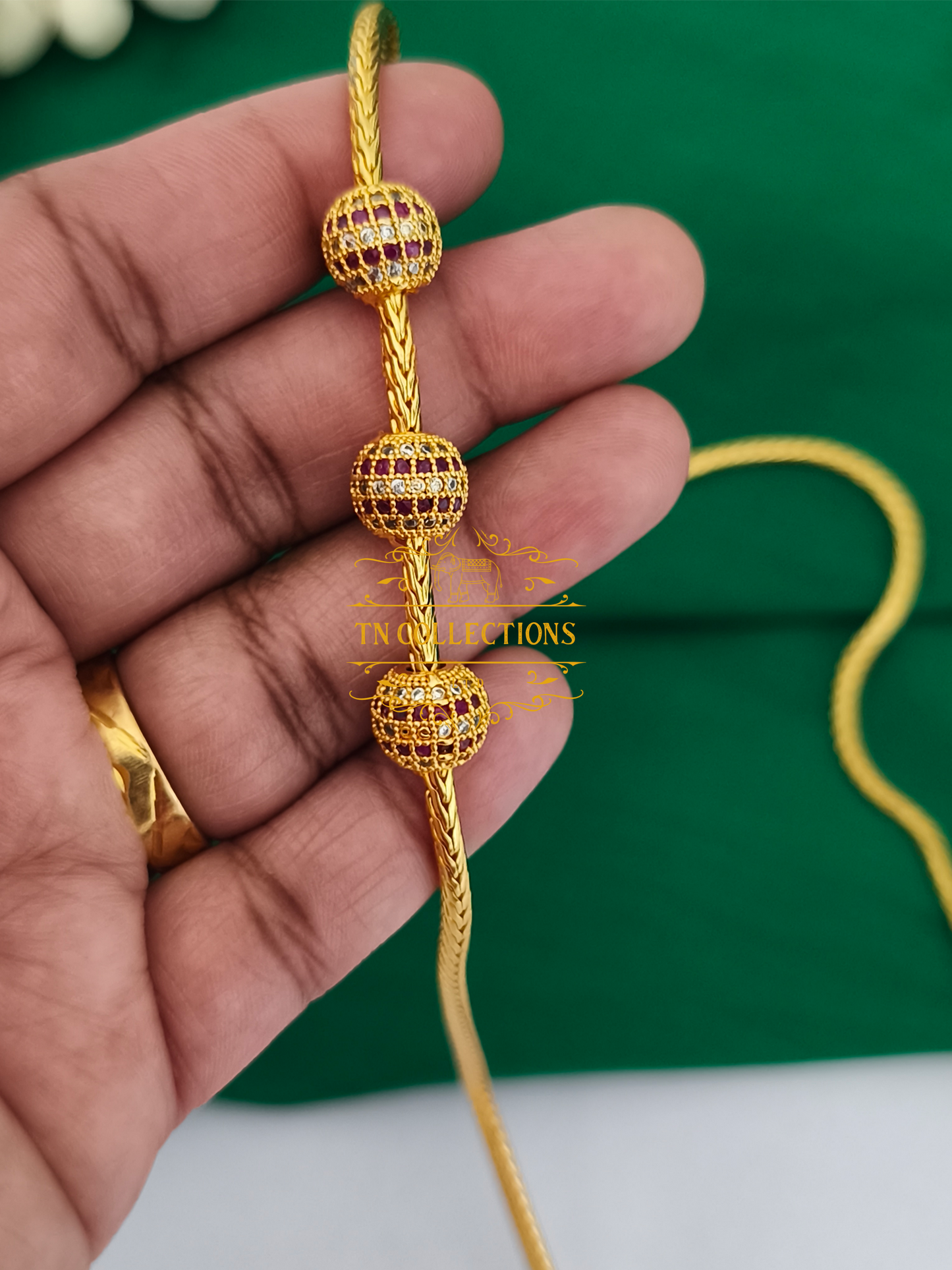 Gold Polish CZ AD stone Mugappu Kodi (Ruby & white stones)