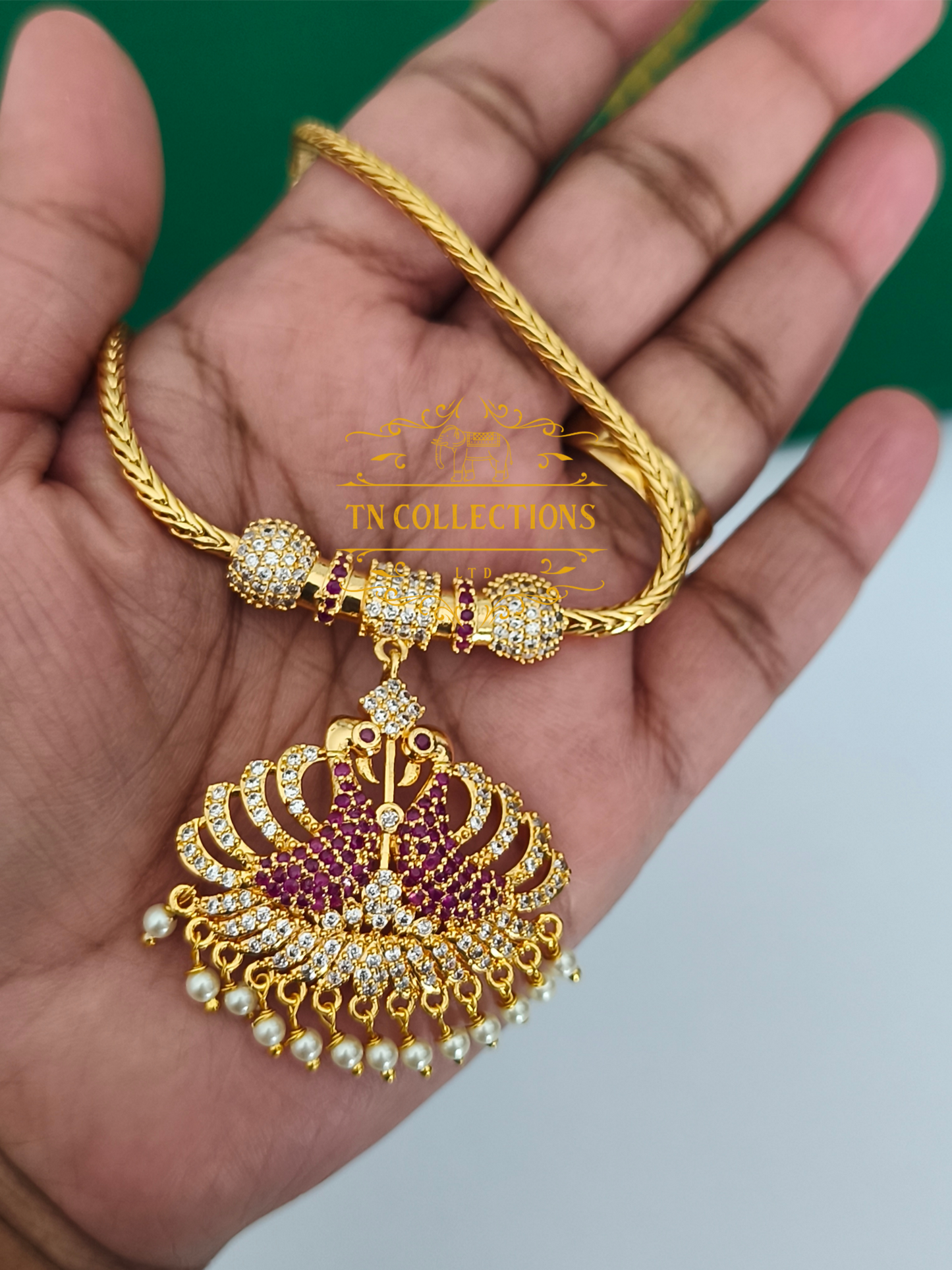 Micro Gold-Plated Peacock Attiyal (Ruby and white stones)