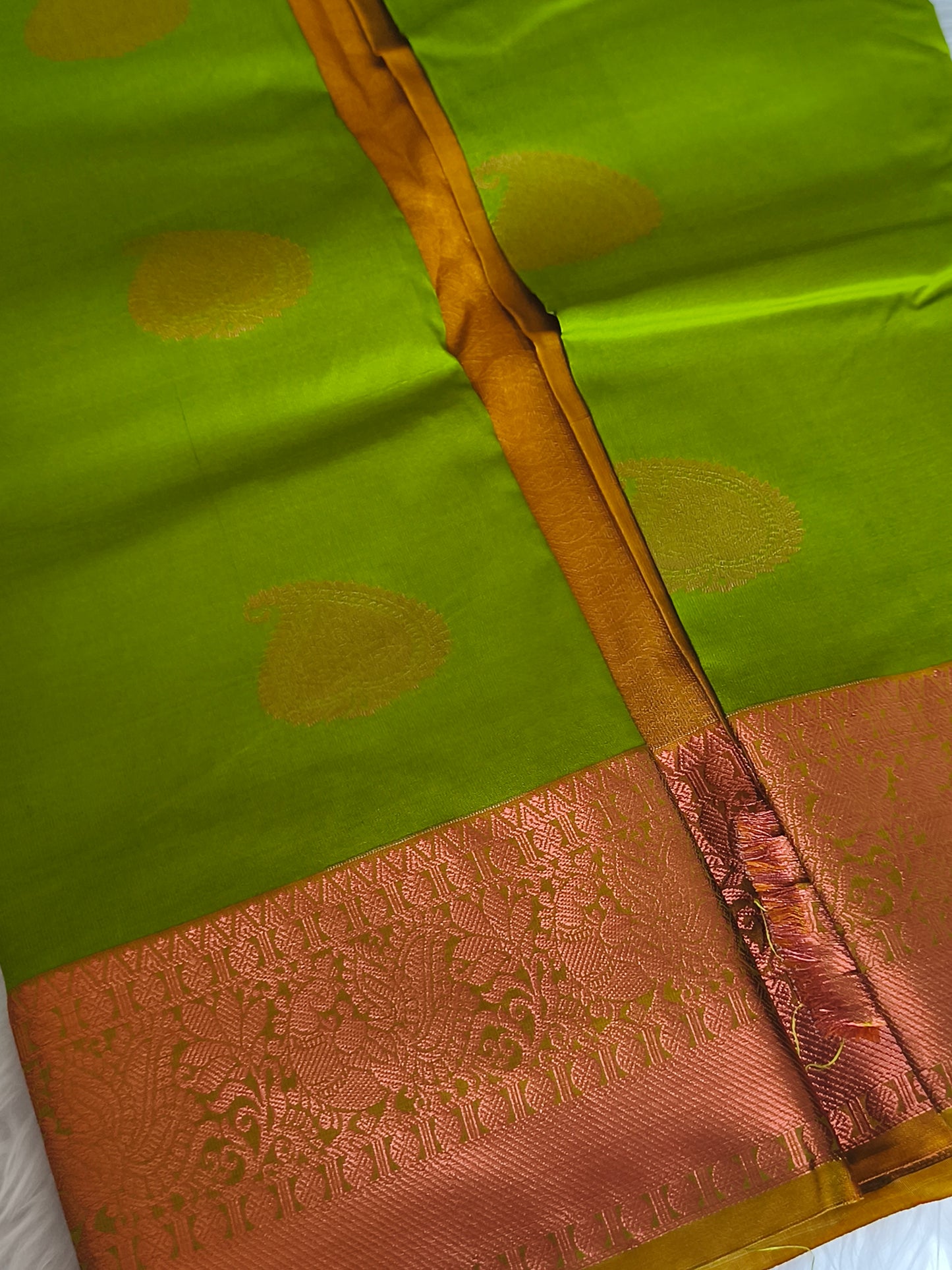 Kanchi Semi silk saree with contrast blouse and pallu.