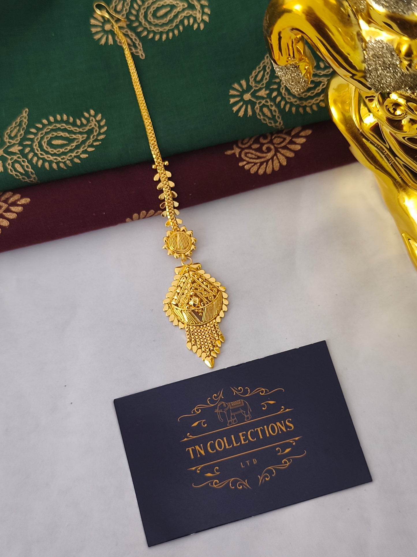 One gram gold forming Tikka