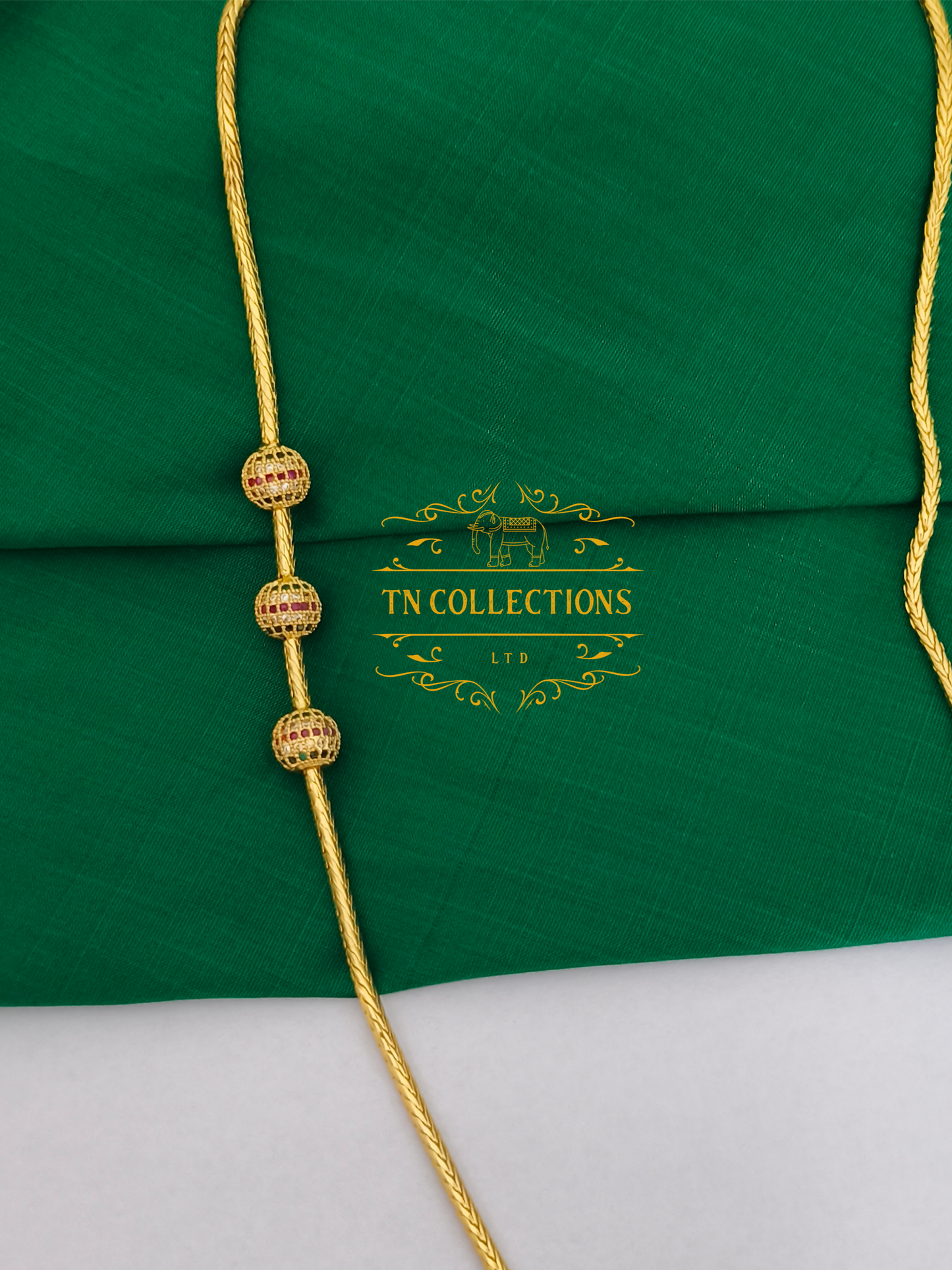 Gold Polish CZ AD stone Mugappu Kodi (Ruby,white & Green stones)