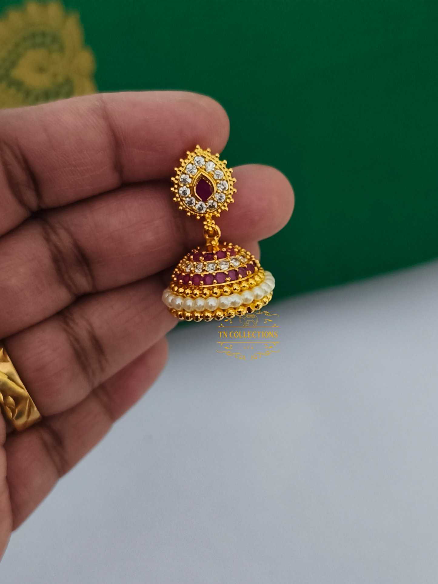Micro Gold plated Jhumkas (Ruby and white stones)