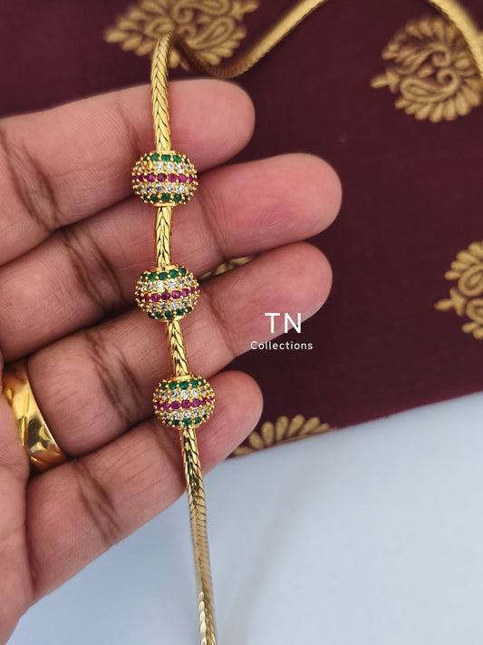 Gold plated Traditional Mugappu Kodi (Ruby,White & Green stones)