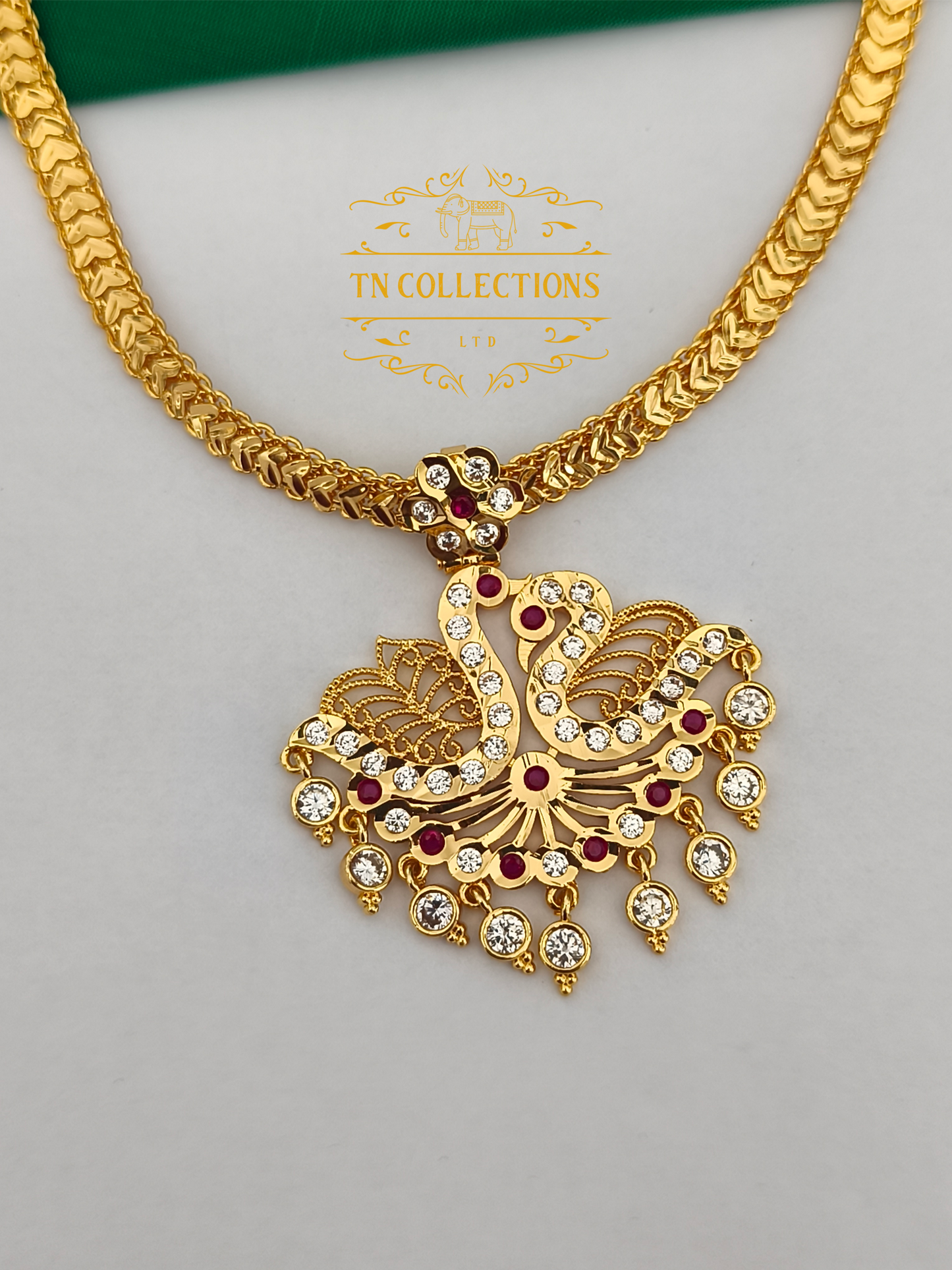 Gold polish impon Attiyal (Ruby & white stones)