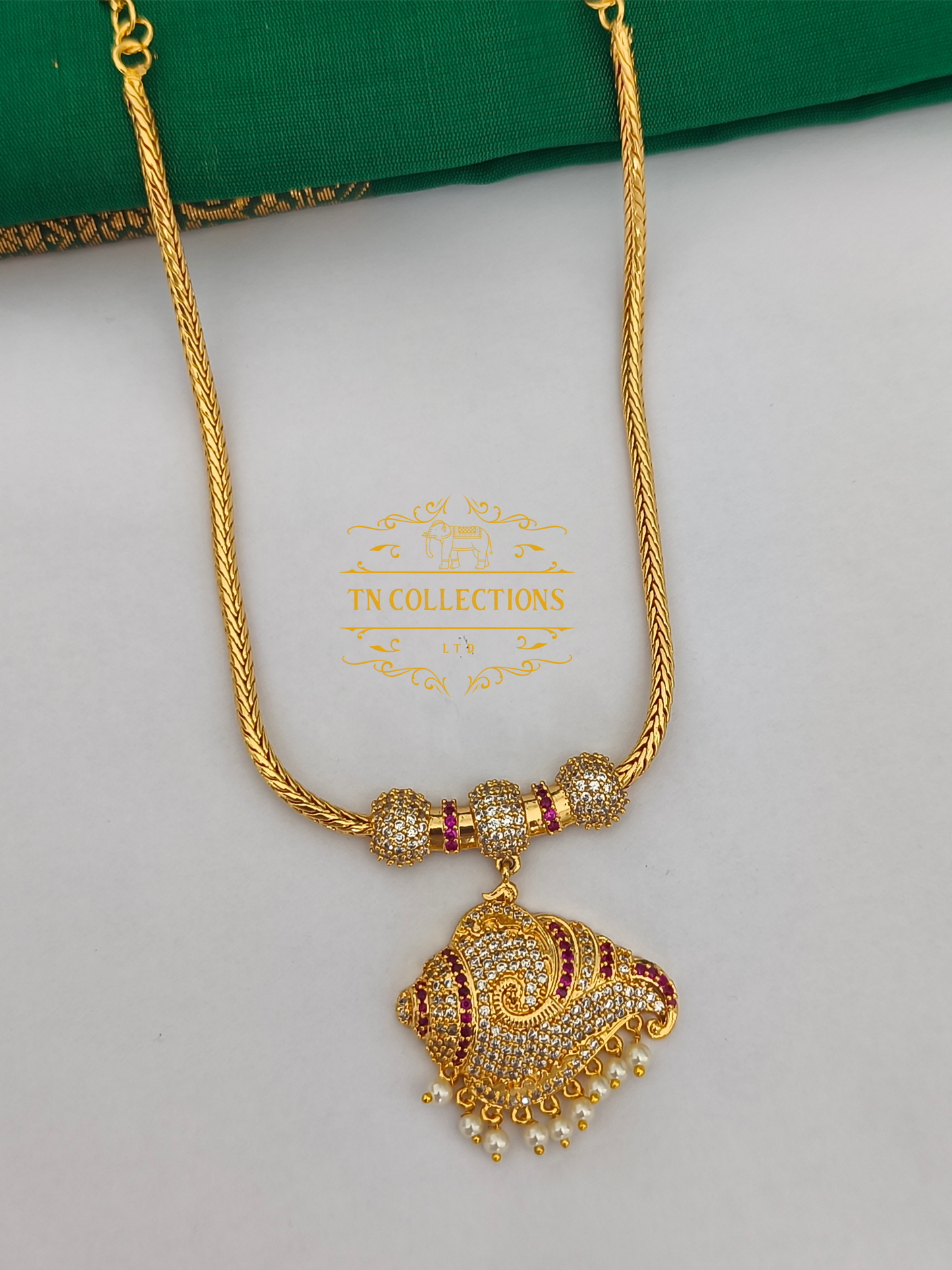 Micro Gold-Plated Traditional Sangu Attiyal (Ruby & white stones)