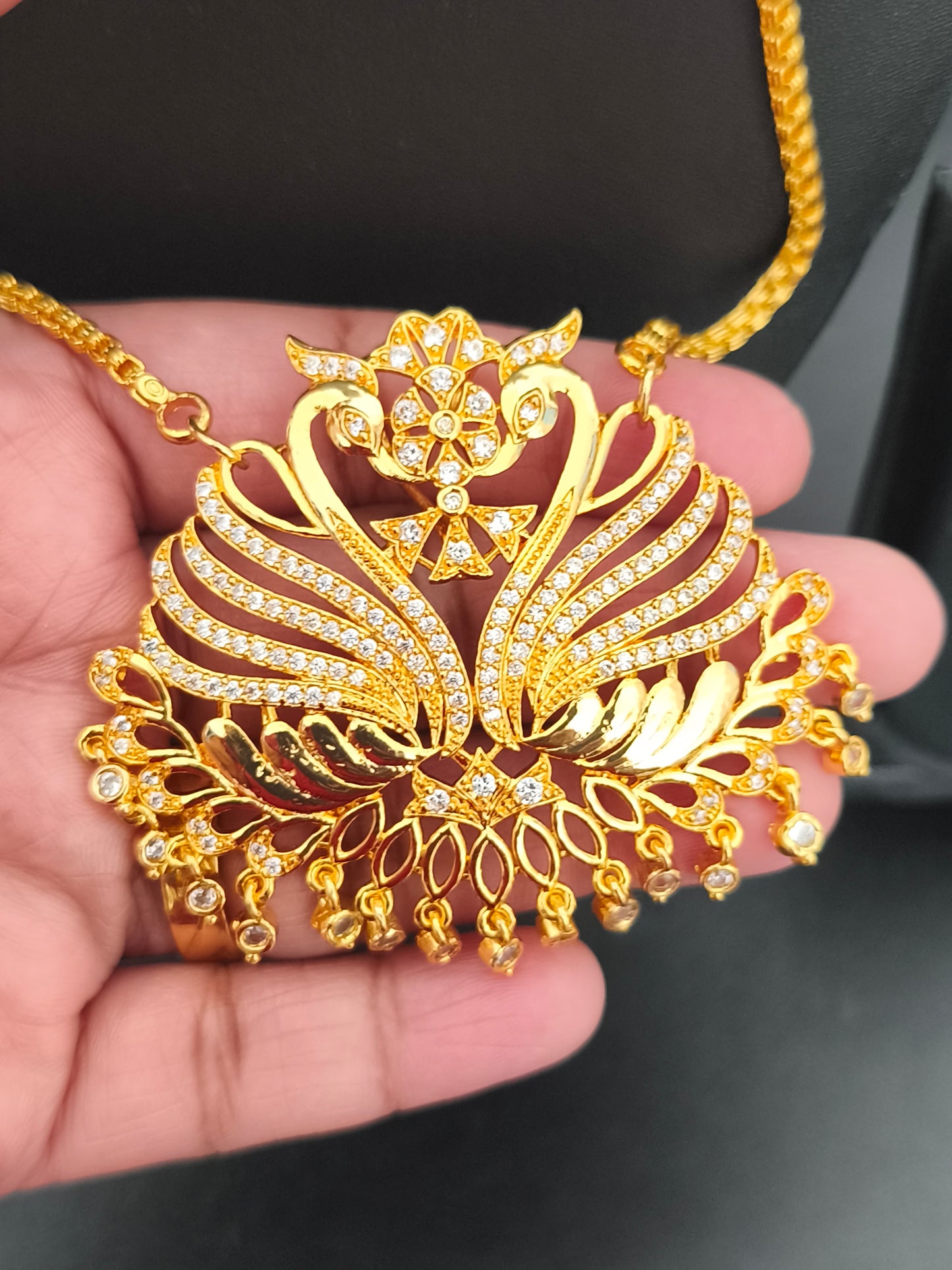 Micro gold Swan Pathakkam