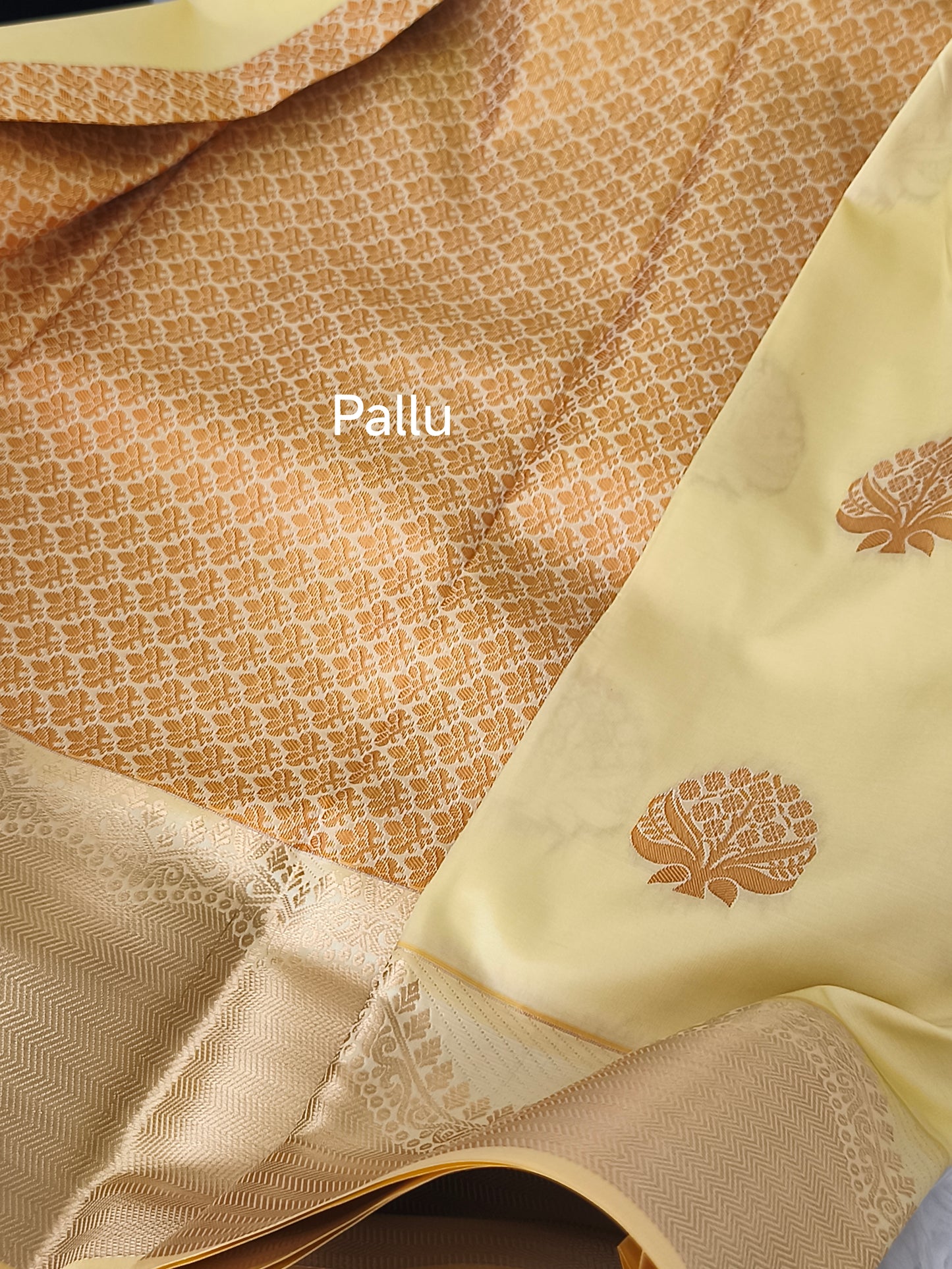 Yellow Kanchi embossed soft silk saree