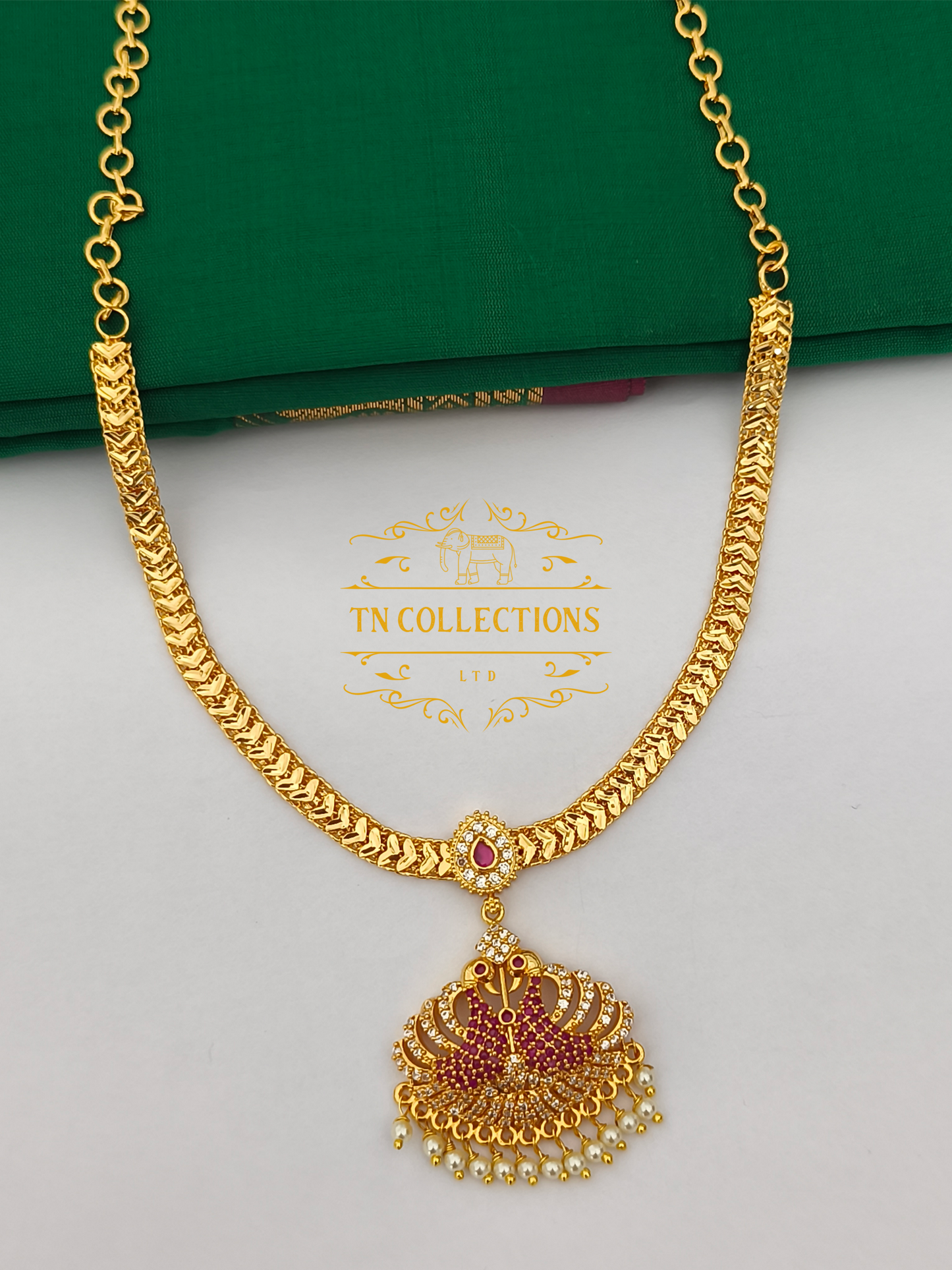 Micro Gold-Plated Peacock Attiyal (Ruby and white stones)