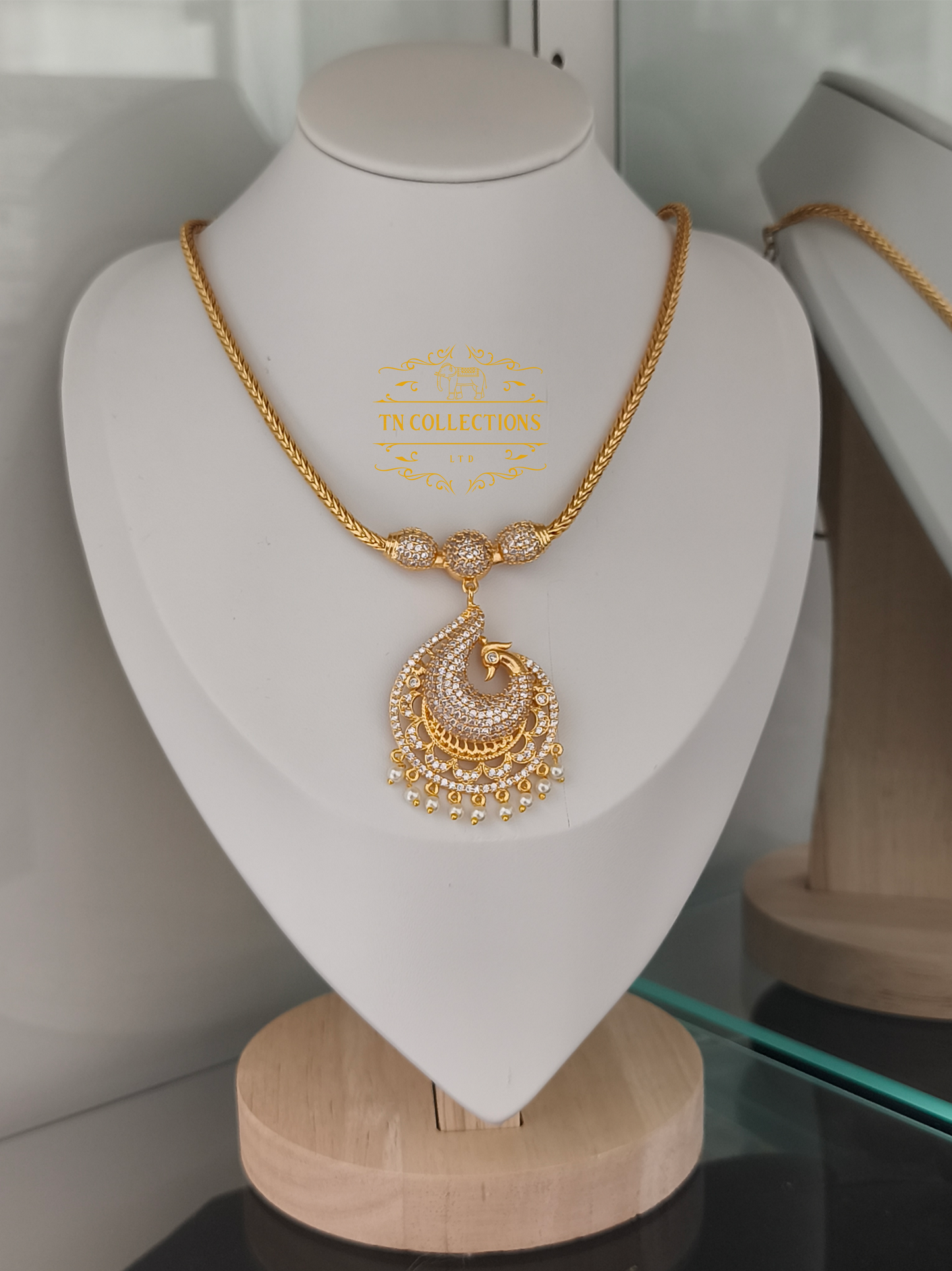 Micro Gold-Plated Traditional Peacock Attiyal (Full white stones)
