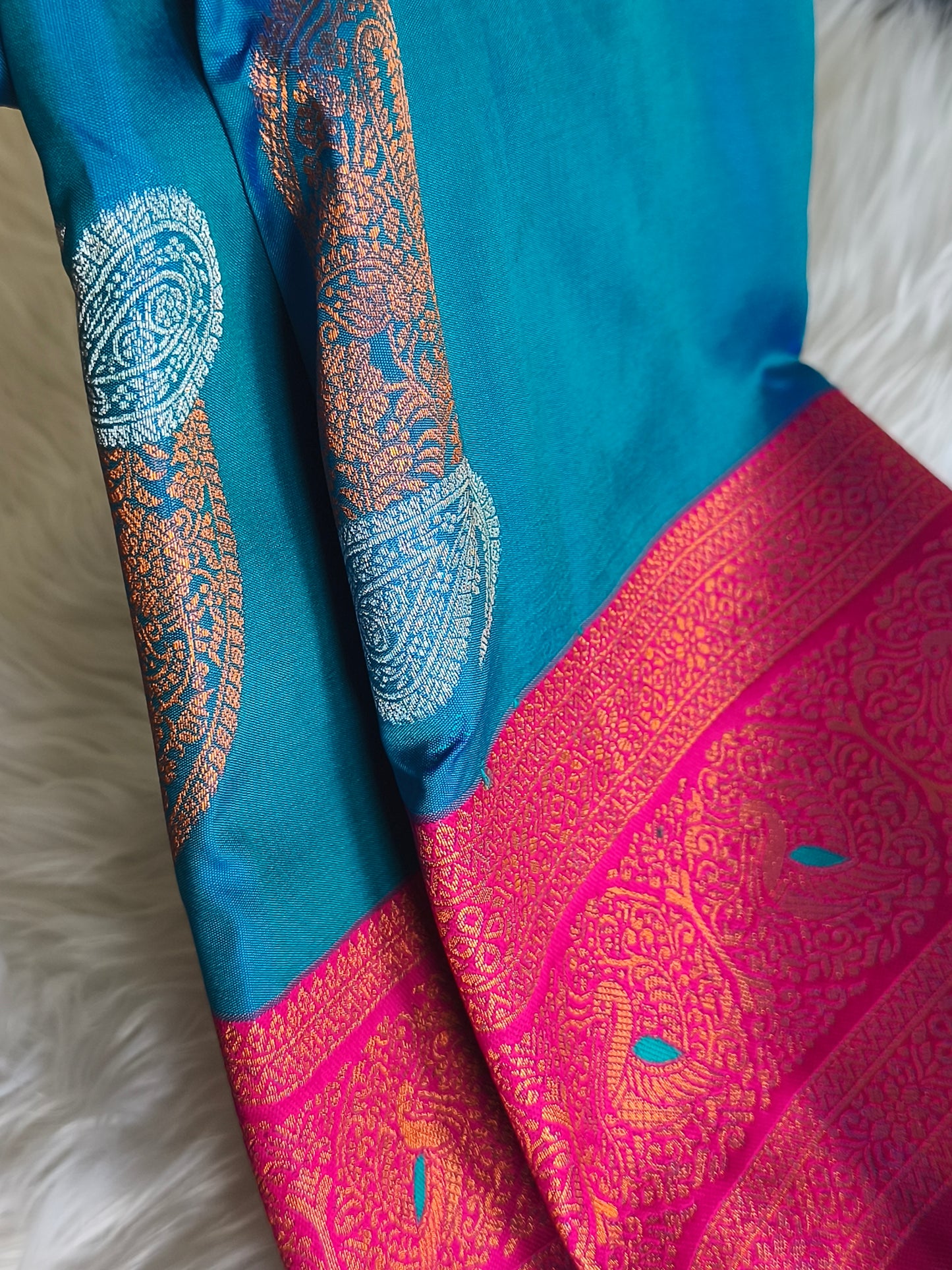 Peacock blue Kanchi Soft Silk Saree with contrast blouse and rich pallu