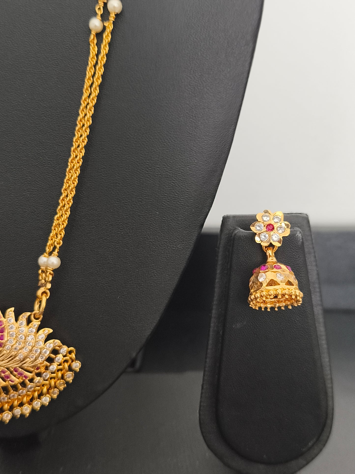 Impon Lotus Pathakkam with earrings