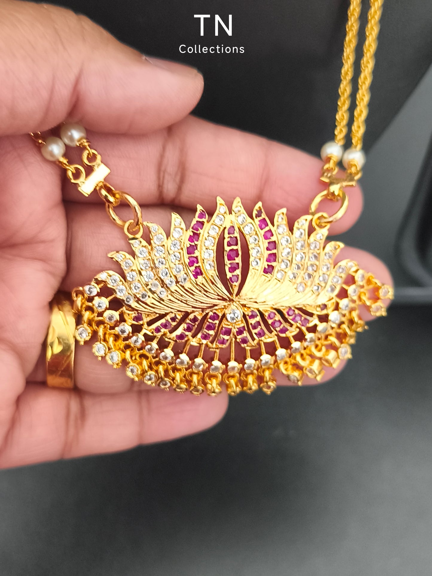 Impon Lotus Pathakkam with earrings
