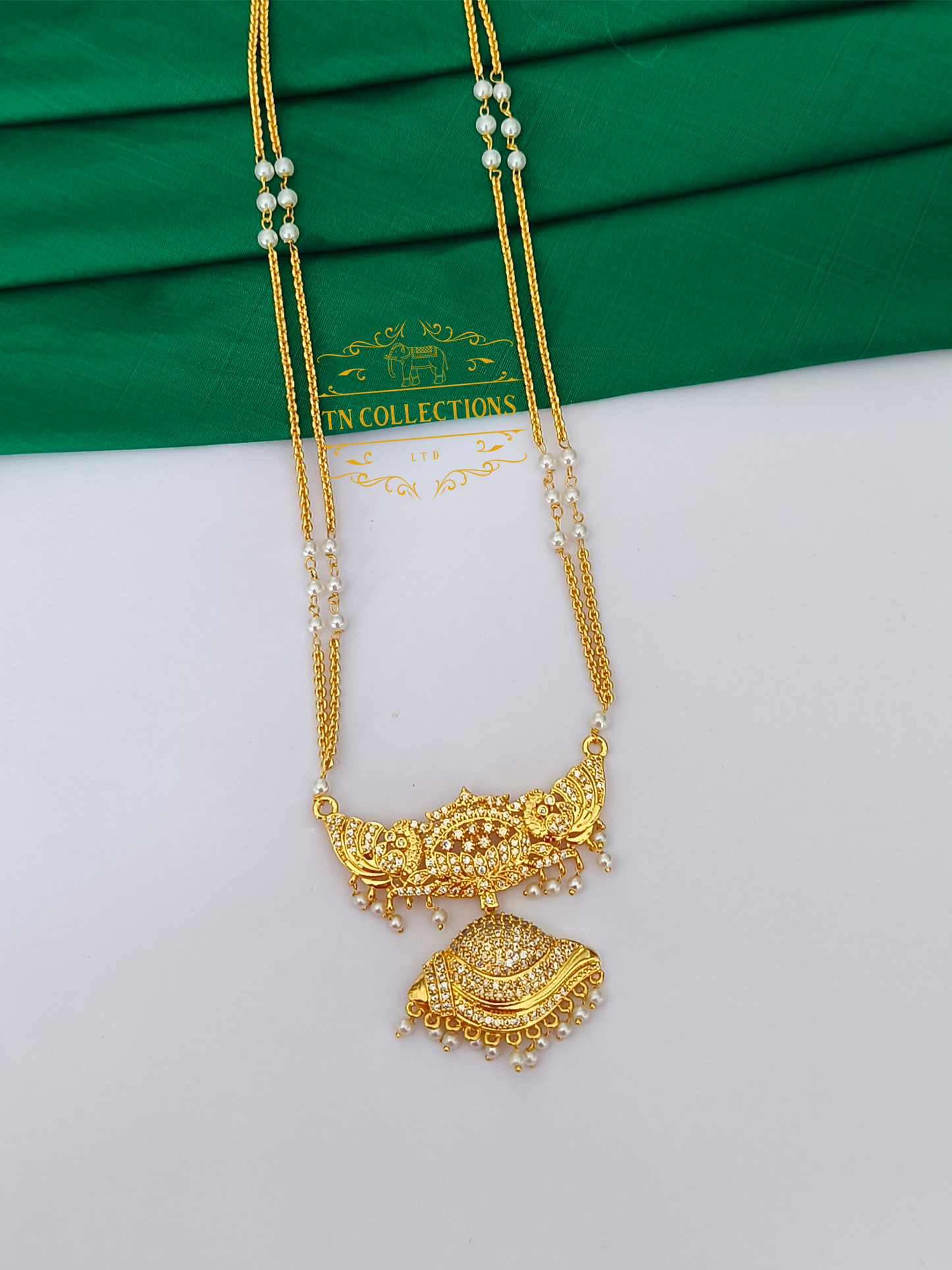 Micro Gold Finish Traditional Pathakkam with Pearl chain (Full White stones)