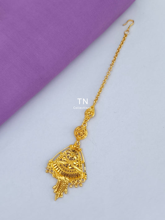 Gold plated tikka